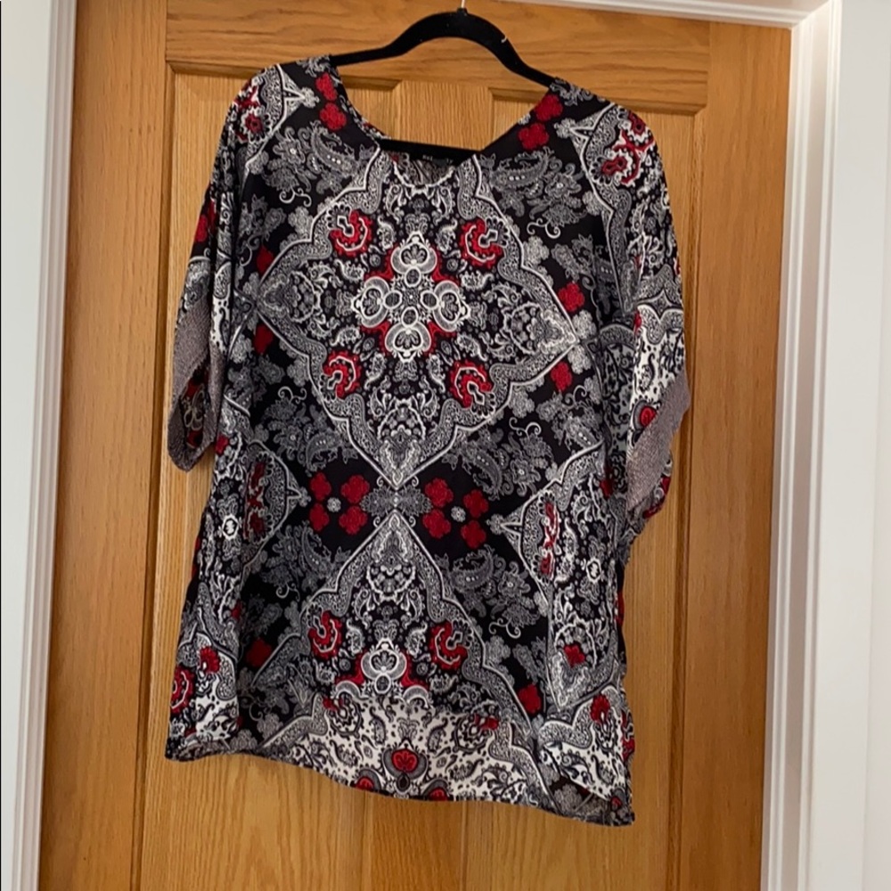 Sheer, short sleeved blouse